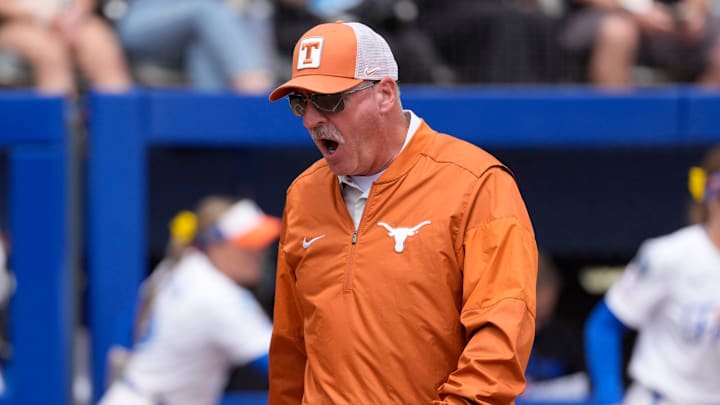 Texas Longhorns head coach Mike White shouts during a Women's College World Series softball game.