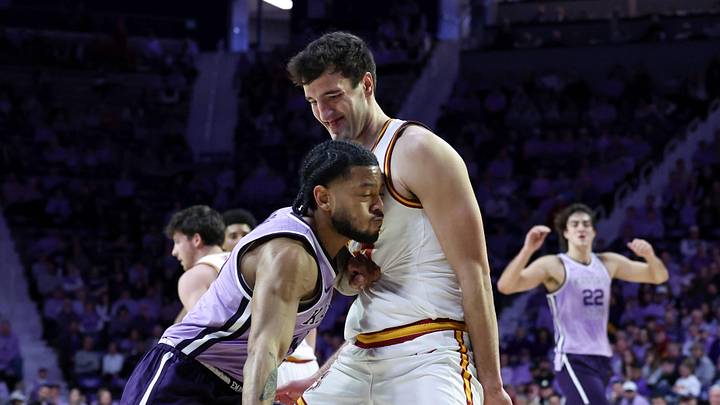 Feb 1, 2026; Manhattan, Kansas, USA; Iowa State Cyclones forward Milan Momcilovic (22) guards Kansas State Wildcats guard David Castillo (10) during the first half at Bramlage Coliseum.