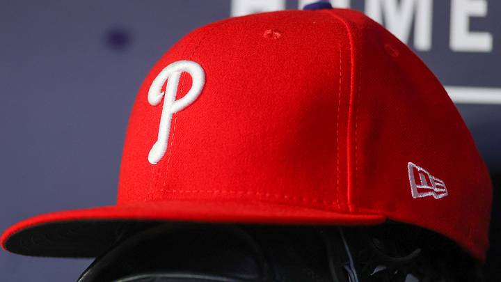 May 26, 2023; Atlanta, Georgia, USA; A detailed view of a Philadelphia Phillies hat and glove on the bench against the Atlanta Braves in the seventh inning at Truist Park. Mandatory Credit: Brett Davis-USA TODAY Sports May 26, 2023; Atlanta, Georgia, USA; A detailed view of a Philadelphia Phillies hat and glove on the bench against the Atlanta Braves in the seventh inning at Truist Park. Mandatory Credit: Brett Davis-USA TODAY Sports