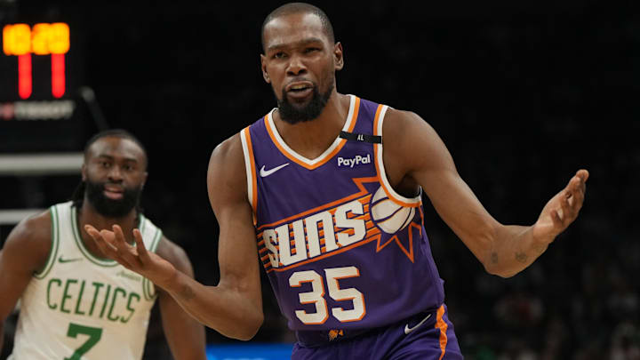 Mar 26, 2025; Phoenix, Arizona, USA; Phoenix Suns forward Kevin Durant (35) reacts after a foul call against the Boston Celtics during the first half at Footprint Center. Mandatory Credit: Rick Scuteri-Imagn Images