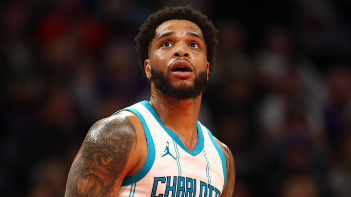 Jan 12, 2025; Phoenix, Arizona, USA; Charlotte Hornets forward Miles Bridges (0) against the Phoenix Suns at Footprint Center. Mandatory Credit: Mark J. Rebilas-Imagn Images