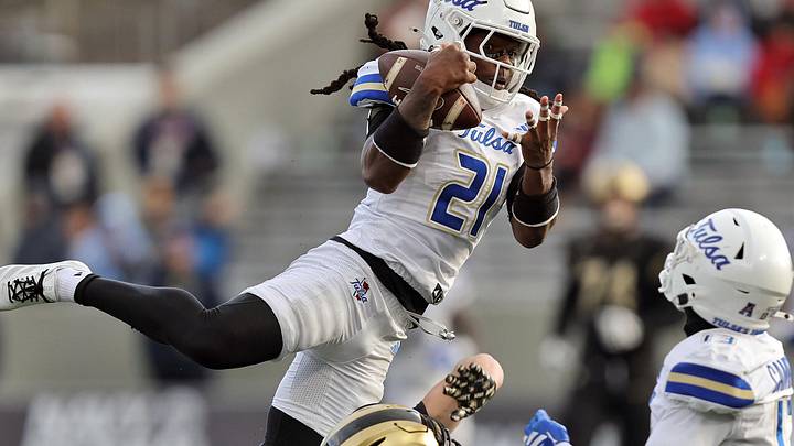 Tulsa Golden Hurricane safety Lento Smith Jr. intercepts a pass.