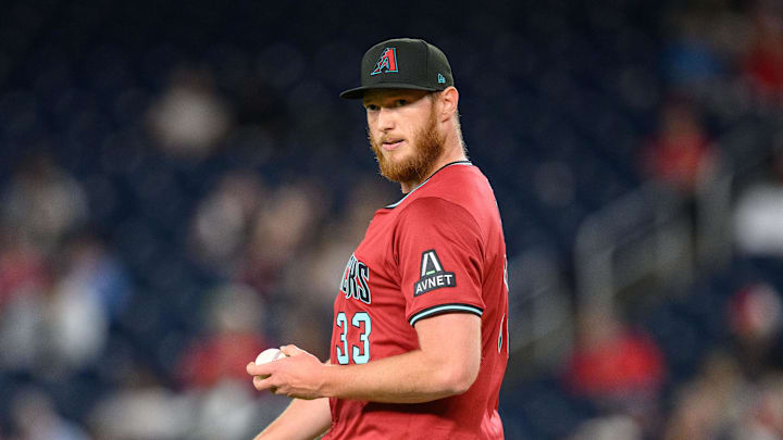 Apr 4, 2025; Washington, District of Columbia, USA; Arizona Diamondbacks pitcher A.J. Puk (33) looks on during the eighth inning against the Washington Nationals at Nationals Park. Mandatory Credit: Reggie Hildred-Imagn Images Apr 4, 2025; Washington, District of Columbia, USA; Arizona Diamondbacks pitcher A.J. Puk (33) looks on during the eighth inning against the Washington Nationals at Nationals Park. Mandatory Credit: Reggie Hildred-Imagn Images