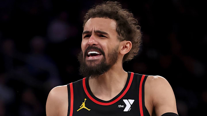 Trae Young #5 of the Atlanta Hawks reacts against the New York Knicks.