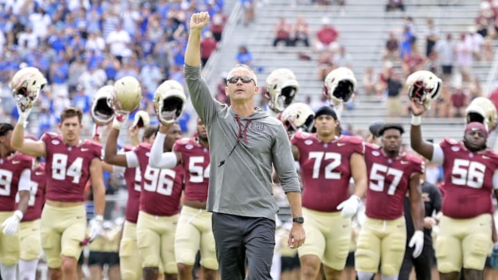 Sep 14, 2024; Tallahassee, Florida, USA; Florida State Seminoles head coach Mike Norvell leads his team before a game against the Memphis Tigers at Doak S. Campbell Stadium. Mandatory Credit: Melina Myers-Imagn Images Sep 14, 2024; Tallahassee, Florida, USA; Florida State Seminoles head coach Mike Norvell leads his team before a game against the Memphis Tigers at Doak S. Campbell Stadium. Mandatory Credit: Melina Myers-Imagn Images