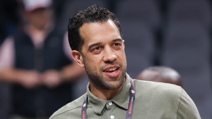 Atlanta Hawks general manager Landry Fields looks on before a game against the Charlotte Hornets.