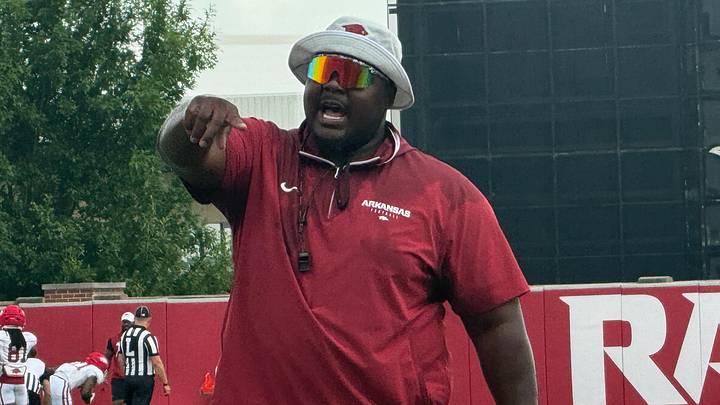 Arkansas offensive line coach Marcus Johnson instructs his players during Friday's training camp on Aug. 7, 2026. Arkansas offensive line coach Marcus Johnson instructs his players during Friday's training camp on Aug. 7, 2026.