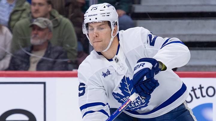 Mar 21, 2026; Ottawa, Ontario, CAN; Toronto Maple Leafs defenseman Brandon Carlo (25) shoots the puck in the first period against the Ottawa Senators at the Canadian Tire Centre. Mandatory Credit: Marc DesRosiers-IMAGN Images