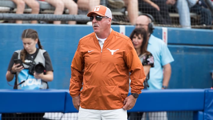 Texas Longhorns head coach Mike White look on in the sixth inning against the Florida Gators.