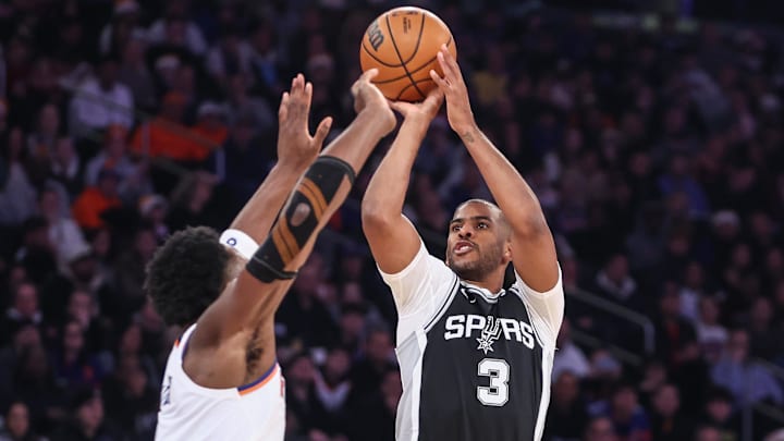 San Antonio Spurs guard Chris Paul (3) shoots over New York Knicks forward OG Anunoby (8) in the first quarter at Madison Square Garden. San Antonio Spurs guard Chris Paul (3) shoots over New York Knicks forward OG Anunoby (8) in the first quarter at Madison Square Garden.