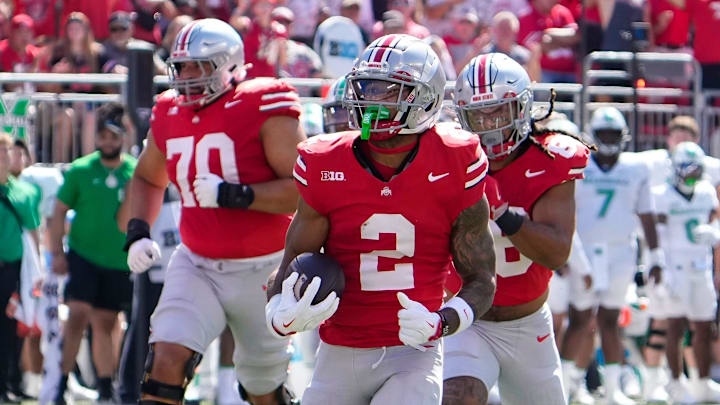 Ohio State receiver Emeka Egbuka runs for a touchdown against Marshall.