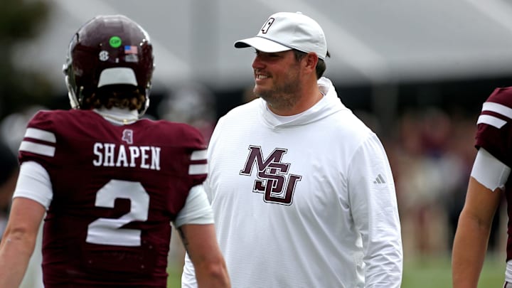 Mississippi State Bulldogs head coach Jeff Lebby (right) reacts with quarterback Blake Shapen (2) during warm ups prior to the game against the Texas Longhorns  at Davis Wade Stadium at Scott Field.
