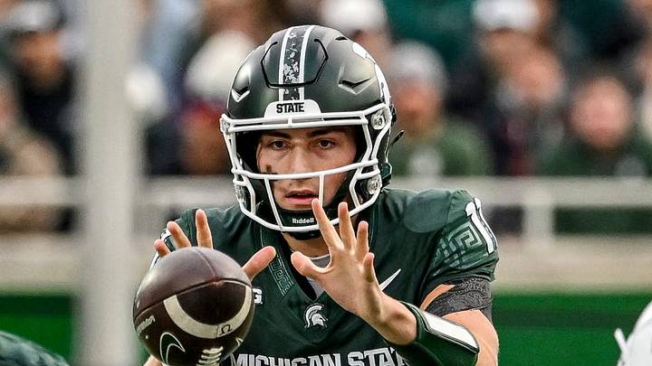 Michigan State's Alessio Milivojevic takes the snap on a play against Penn State during the first quarter on Saturday, Nov. 15, 2025, at Spartan Stadium in East Lansing. Michigan State's Alessio Milivojevic takes the snap on a play against Penn State during the first quarter on Saturday, Nov. 15, 2025, at Spartan Stadium in East Lansing.