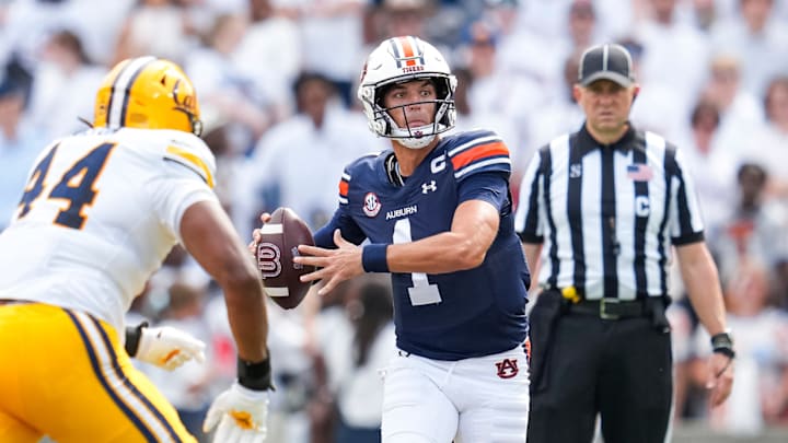 Auburn Tigers quarterback threw four interceptions in a 21-14 loss to the Cal Golden Bears. Auburn Tigers quarterback threw four interceptions in a 21-14 loss to the Cal Golden Bears.