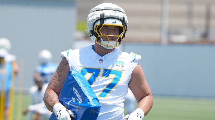Jun 17, 2026; El Segundo, CA, USA; Los Angeles Chargers tackle Travis Burke (77) during minicamp at The Bolt. Mandatory Credit: Kirby Lee-Imagn Images Jun 17, 2026; El Segundo, CA, USA; Los Angeles Chargers tackle Travis Burke (77) during minicamp at The Bolt. Mandatory Credit: Kirby Lee-Imagn Images