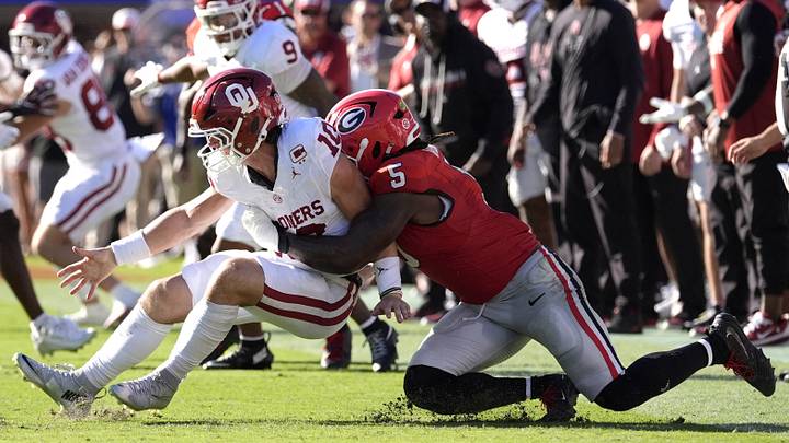 Georgia Bulldogs linebacker Raylen Wilson (5) sacks Oklahoma Sooners quarterback John Mateer (10) which results in a fumble during the first half at Sanford Stadium. Mandatory Credit: Dale Zanine-Imagn Images Georgia Bulldogs linebacker Raylen Wilson (5) sacks Oklahoma Sooners quarterback John Mateer (10) which results in a fumble during the first half at Sanford Stadium. Mandatory Credit: Dale Zanine-Imagn Images