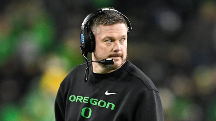 Dec 20, 2025; Eugene, OR, USA;  Oregon Ducks head coach Dan Lanning looks on during the fourth quarter against the James Madison Dukes at Autzen Stadium. Mandatory Credit: Craig Strobeck-Imagn Images