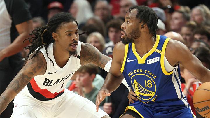 Oct 7, 2026; Portland, Oregon, USA;  Portland Trail Blazers guard Ja Morant (1) defends Golden State Warriors guard Lj Cryer (18) during the first half at Moda Center.  Mandatory Credit: Jaime Valdez-Imagn Images