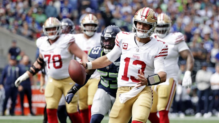 Sep 7, 2025; Seattle, Washington, USA; San Francisco 49ers quarterback Brock Purdy (13) runs the ball during the first half against San Francisco 49ers at Lumen Field. Mandatory Credit: Joe Nicholson-Imagn Images