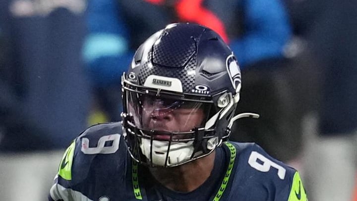 Seattle Seahawks running back Kenneth Walker III runs as New England Patriots defensive tackle Christian Barmore defends. Seattle Seahawks running back Kenneth Walker III runs as New England Patriots defensive tackle Christian Barmore defends.