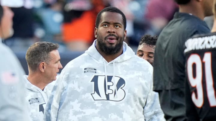 Injured Cincinnati Bengals defensive tackle B.J. Hill (92) stands on the sideline in the fourth quarter of the NFL Week 9 game between the Cincinnati Bengals and the Las Vegas Raiders at Paycor Stadium in downtown Cincinnati on Sunday, Nov. 3, 2024. The Bengals collected their first win at home with a 41-24 victory over the Raiders. Injured Cincinnati Bengals defensive tackle B.J. Hill (92) stands on the sideline in the fourth quarter of the NFL Week 9 game between the Cincinnati Bengals and the Las Vegas Raiders at Paycor Stadium in downtown Cincinnati on Sunday, Nov. 3, 2024. The Bengals collected their first win at home with a 41-24 victory over the Raiders.