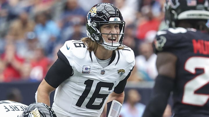 Sep 29, 2024; Houston, Texas, USA; Jacksonville Jaguars quarterback Trevor Lawrence (16) at the line of scrimmage during the second quarter against the Houston Texans at NRG Stadium. Mandatory Credit: Troy Taormina-Imagn Images