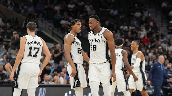 Nov 9, 2022; San Antonio, Texas, USA; San Antonio Spurs guard Devin Vassell (24) celebrates a play by San Antonio Spurs center Charles Bassey (28) in the first half against the Memphis Grizzlies at the AT&T Center. Mandatory Credit: Daniel Dunn-Imagn Images Nov 9, 2022; San Antonio, Texas, USA; San Antonio Spurs guard Devin Vassell (24) celebrates a play by San Antonio Spurs center Charles Bassey (28) in the first half against the Memphis Grizzlies at the AT&T Center. Mandatory Credit: Daniel Dunn-Imagn Images