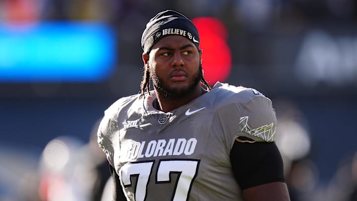 Nov 16, 2024; Boulder, Colorado, USA; Colorado Buffaloes offensive tackle Jordan Seaton (77) looks on before the game against the Utah Utes at Folsom Field. Mandatory Credit: Ron Chenoy-Imagn Images