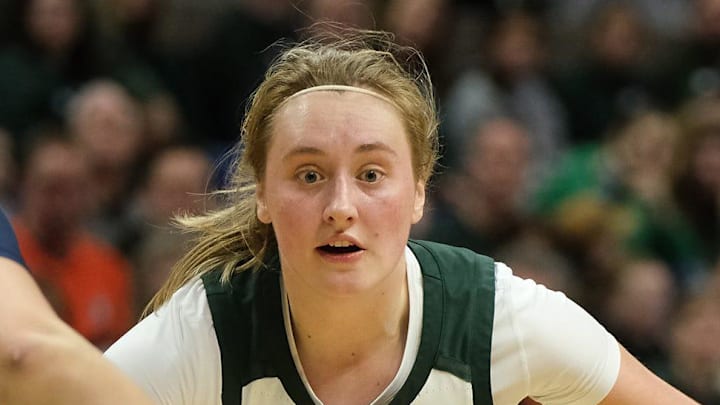 MSU guard Kennedy Blair (35) looks to get past Illinois forward Cearah Parchment (30) in Big 10 action Sunday, Jan. 4, 2026 at the Breslin Center.