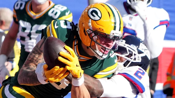 Green Bay Packers wide receiver Christian Watson catches a touchdown pass against New York Giants cornerback Deonte Banks.