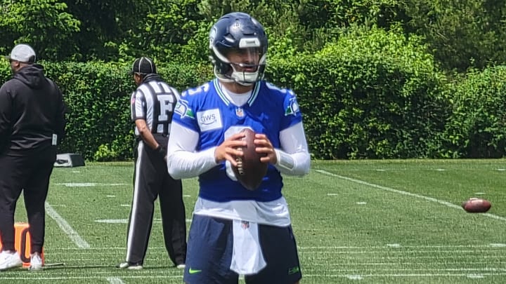Quarterback Sam Howell prepares for a drill during the Seahawks fifth OTA practice at the VMAC.