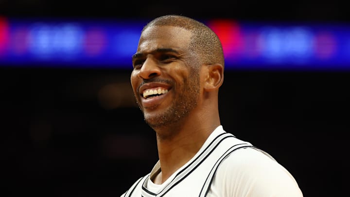 Dec 3, 2024; Phoenix, Arizona, USA; San Antonio Spurs guard Chris Paul (3) against the Phoenix Suns during an NBA Cup game at Footprint Center. Mandatory Credit: Mark J. Rebilas-Imagn Images