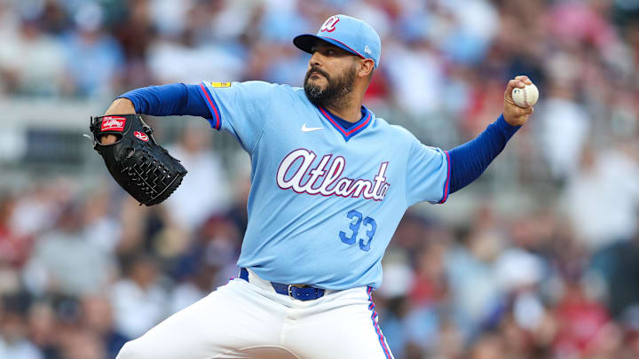 Apr 11, 2026; Atlanta, Georgia, USA; Atlanta Braves starting pitcher Martin Perez (33) throws against the Cleveland Guardians in the first inning at Truist Park. Mandatory Credit: Brett Davis-Imagn Images