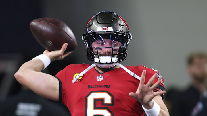 Dec 22, 2024; Arlington, Texas, USA; Tampa Bay Buccaneers quarterback Baker Mayfield (6) throws a pass before the game against the Dallas Cowboys at AT&T Stadium. Mandatory Credit: Tim Heitman-Imagn Images