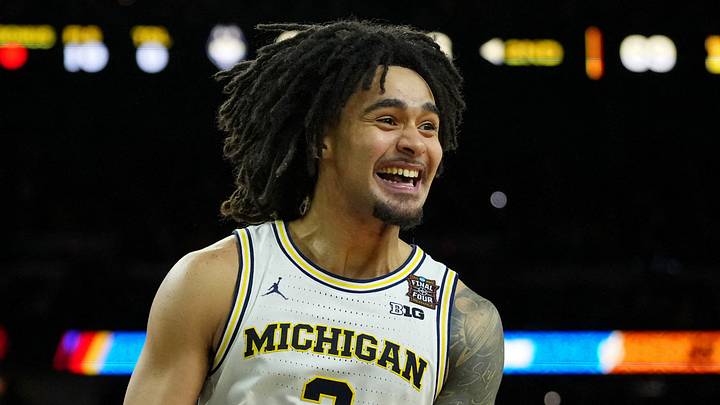 Apr 6, 2026; Indianapolis, IN, USA; Michigan Wolverines guard Elliot Cadeau (3) celebrates after their win against the UConn Huskies in the national championship of the Final Four of the men's 2026 NCAA Tournament between the and the Michigan Wolverines at Lucas Oil Stadium. Mandatory Credit: Bob Donnan-Imagn Images Apr 6, 2026; Indianapolis, IN, USA; Michigan Wolverines guard Elliot Cadeau (3) celebrates after their win against the UConn Huskies in the national championship of the Final Four of the men's 2026 NCAA Tournament between the and the Michigan Wolverines at Lucas Oil Stadium. Mandatory Credit: Bob Donnan-Imagn Images