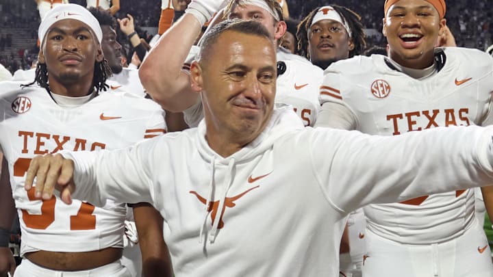 Oct 25, 2025; Starkville, Mississippi, USA; Texas Longhorns head coach Steve Sarkisian reacts with defensive linemen Colin Simmons (1) after beating the Mississippi State Bulldogs in overtime at Davis Wade Stadium at Scott Field. Mandatory Credit: Petre Thomas-Imagn Images Oct 25, 2025; Starkville, Mississippi, USA; Texas Longhorns head coach Steve Sarkisian reacts with defensive linemen Colin Simmons (1) after beating the Mississippi State Bulldogs in overtime at Davis Wade Stadium at Scott Field. Mandatory Credit: Petre Thomas-Imagn Images