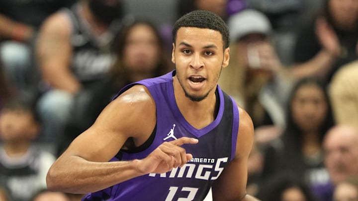 Apr 11, 2025; Sacramento, California, USA; Sacramento Kings forward Keegan Murray (13) dribbles against the Los Angeles Clippers during the first quarter at Golden 1 Center. Mandatory Credit: Darren Yamashita-Imagn Images