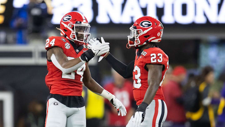 Jan 9, 2023; Inglewood, CA, USA; Georgia Bulldogs defensive back Malaki Starks (24) and defensive back Tykee Smith (23) against the TCU Horned Frogs during the CFP national championship game at SoFi Stadium. Mandatory Credit: Mark J. Rebilas-Imagn Images Jan 9, 2023; Inglewood, CA, USA; Georgia Bulldogs defensive back Malaki Starks (24) and defensive back Tykee Smith (23) against the TCU Horned Frogs during the CFP national championship game at SoFi Stadium. Mandatory Credit: Mark J. Rebilas-Imagn Images