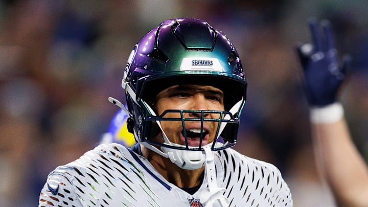 Zach Charbonnet of the Seattle Seahawks smiles