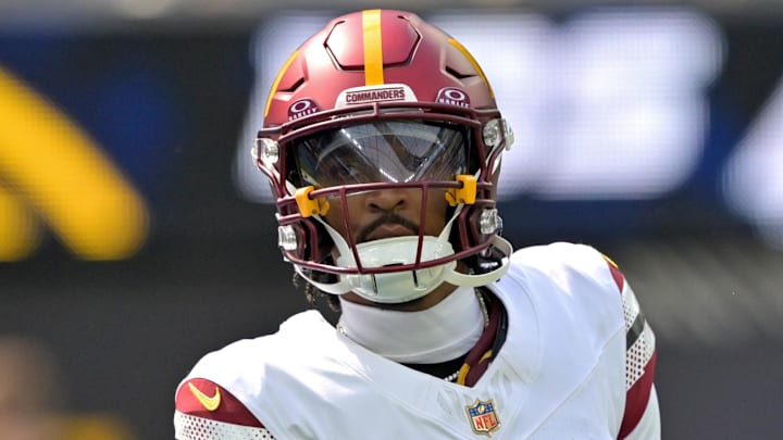 Oct 5, 2025; Inglewood, California, USA;  Washington Commanders quarterback Jayden Daniels (5) warms up prior to the game against the Washington Commanders at SoFi Stadium. Mandatory Credit: Jayne Kamin-Oncea-Imagn Images