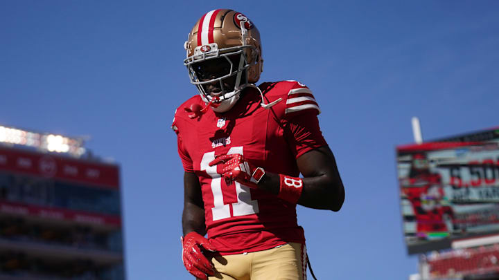 Brandon Aiyuk warms up for 49ers.
