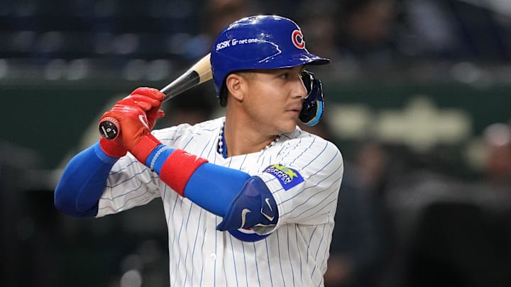 Mar 15, 2025; Bunkyo, Tokyo, Japan; Chicago Cubs catcher Miguel Amaya (9) bats against the Hanshin Tigers during the third inning at Tokyo Dome. Mar 15, 2025; Bunkyo, Tokyo, Japan; Chicago Cubs catcher Miguel Amaya (9) bats against the Hanshin Tigers during the third inning at Tokyo Dome.