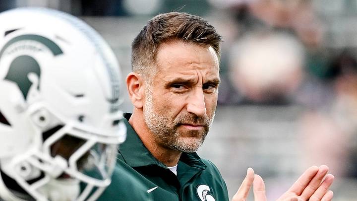 Michigan State's defensive coordinator Joe Rossi watches during warmups before the football game against Western Michigan on Friday, Aug. 29, 2025, in East Lansing. Michigan State's defensive coordinator Joe Rossi watches during warmups before the football game against Western Michigan on Friday, Aug. 29, 2025, in East Lansing.
