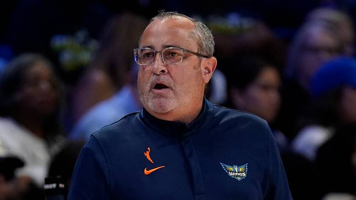 Arlington, Texas, USA;  Dallas Wings head coach Jose Fernandez looks on from the bench against the Toronto Tempo during the third quarter at College Park Center on August 12, 2026.