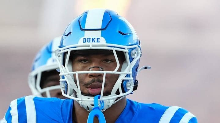 Aug 28, 2025; Durham, North Carolina, USA;  Duke Blue Devils defensive tackle Aaron Hall (99) comes out onto the field before the start of the game against the Elon Phoenix at Wallace Wade Stadium. Mandatory Credit: James Guillory-Imagn Images