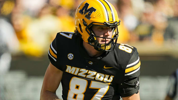 Oct 19, 2024; Columbia, Missouri, USA; Missouri Tigers tight end Brett Norfleet (87) runs with the ball during the first half against the Auburn Tigers at Faurot Field at Memorial Stadium. Mandatory Credit: Jay Biggerstaff-Imagn Images Oct 19, 2024; Columbia, Missouri, USA; Missouri Tigers tight end Brett Norfleet (87) runs with the ball during the first half against the Auburn Tigers at Faurot Field at Memorial Stadium. Mandatory Credit: Jay Biggerstaff-Imagn Images