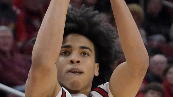 Jan 24, 2026; Louisville, Kentucky, USA;  Louisville Cardinals guard Mikel Brown Jr. (0) shoots against the Virginia Tech Hokies during the first half at KFC Yum! Center. Mandatory Credit: Jamie Rhodes-Imagn Images
