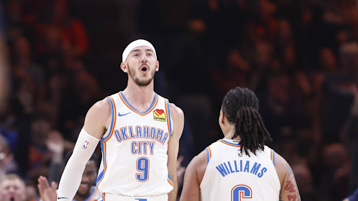 Dec 23, 2024; Oklahoma City, Oklahoma, USA; Oklahoma City Thunder guard Alex Caruso (9) celebrates after his team scores against the Washington Wizards during the second quarter at Paycom Center. Mandatory Credit: Alonzo Adams-Imagn Images