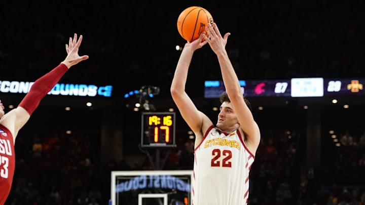 Mar 23, 2024; Omaha, NE, USA; Iowa State Cyclones forward Milan Momcilovic (22) shoots the ball against Washington State Cougars forward Andrej Jakimovski (23) during the second half in the second round of the 2024 NCAA Tournament at CHI Health Center Omaha. Mandatory Credit: Dylan Widger-Imagn Images Mar 23, 2024; Omaha, NE, USA; Iowa State Cyclones forward Milan Momcilovic (22) shoots the ball against Washington State Cougars forward Andrej Jakimovski (23) during the second half in the second round of the 2024 NCAA Tournament at CHI Health Center Omaha. Mandatory Credit: Dylan Widger-Imagn Images