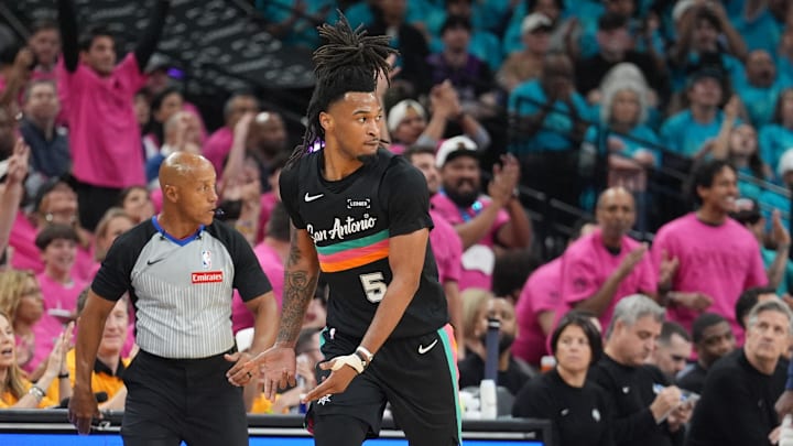 May 4, 2026; San Antonio, Texas, USA; San Antonio Spurs guard Stephon Castle (5) celebrates in the first half against the Minnesota Timberwolves during Game 1 of the second round of the 2026 NBA Playoffs at Frost Bank Center.